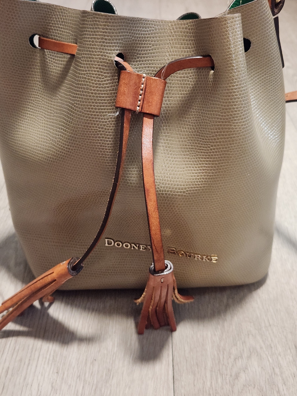 Dooney & Bourke Taupe Lizard Embossed Leather Drawstring Bucket Bag Tassel